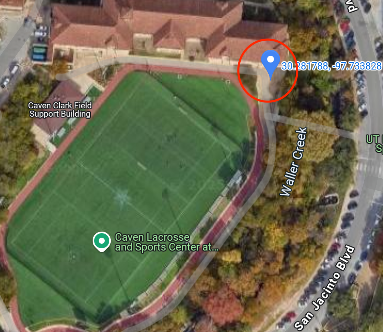 Caven Clark Field ariel view This image shows an ariel view of Caven Clark Field. There is a blue pin inside a red circle indicating the meeting place.